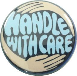 Handle with care Button